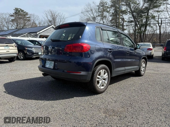 2016 Volkswagen Tiguan S with VIN WVGBV7AX1GW001756, listed as a Copart auction lot 53538165 with 105,641 mi miles and Clean Title. Bid and sale history available at DreamBid. Image 4.