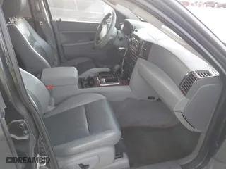 2005 Jeep Grand Cherokee Laredo with VIN 1J4HR48N75C647740, listed as a IAAI auction lot 41803160 with 145,147 mi miles. Bid and sale history available at carsss.com. Image 5.