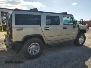 2003 Hummer H2 z VIN 5GRGN23U33H102150, wystawiony jako Copart lot #56997295 z przebiegiem Nie podano mil oraz Tytuł czysty. Historia ofert i sprzedaży dostępna na DreamBid. Obrazek 3.