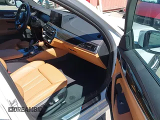 2022 BMW 5 Series 530e xDrive with VIN WBA33AG01NCJ52906, listed as a IAAI auction lot 42686511 with 45,710 mi miles and . Bid and sale history available at DreamBid. Image 5.