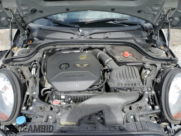 2014 MINI Hardtop with VIN WMWXM5C51ET934047, listed as a Copart auction lot 63039335 with 104,446 mi miles and Salvage title. Bid and sale history available at DreamBid. Image 12.