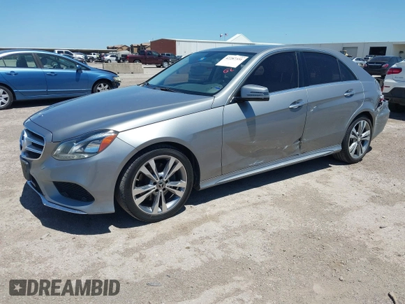 2014 Mercedes-Benz E 350 Sport with VIN WDDHF5KB7EA799411, listed as a IAAI auction lot 42287331 with 192,595 mi miles and . Bid and sale history available at DreamBid. Image 18.