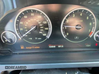 2012 BMW 7 Series 740Li with VIN WBAKB4C55CC576166, listed as a Copart auction lot 52448115 with 154,949 mi miles and Clean Title. Bid and sale history available at carsss.com. Image 8.