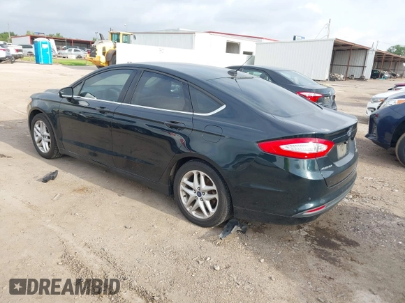 2014 Ford Fusion SE with VIN 3FA6P0HD3ER184294, listed as a IAAI auction lot 42141660 with 216,696 mi miles. Bid and sale history available at carsss.com. Image 3.