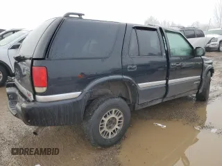1999 GMC Jimmy SLE with VIN 1GKDT13W3X2522381, listed as a Copart auction lot 83219014 with 0 mi miles and Non Repairable. Bid and sale history available at carsss.com. Image 3.