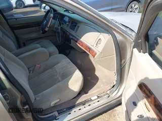 2004 Mercury Grand Marquis GS z VIN 2MEFM74WX4X643435, wystawiony jako IAAI lot #41932119 z przebiegiem 274 468 mil mil oraz . Historia ofert i sprzedaży dostępna na DreamBid. Obrazek 5.