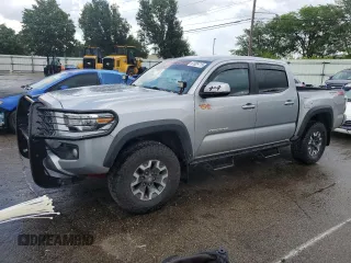 2019 Toyota Tacoma SR with VIN 5TFCZ5AN9KX210021, listed as a Copart auction lot 61829715 with 31,866 mi miles and Salvage title. Bid and sale history available at DreamBid. Image 1.