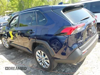2022 Toyota RAV4 XLE Premium with VIN 2T3C1RFVXNW231752, listed as a IAAI auction lot 42072442 with 7,262 mi miles and . Bid and sale history available at DreamBid. Image 3.