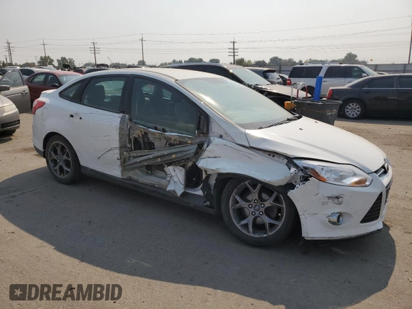 2014 Ford Focus SE with VIN 1FADP3F22EL110454, listed as a Copart auction lot 70076854 with 98,577 mi miles and Salvage Title. Bid and sale history available at carsss.com. Image 4.
