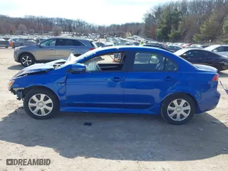 2015 Mitsubishi Lancer ES with VIN JA32U2FU1FU014816, listed as a IAAI auction lot 41783106 with 156,226 mi miles. Bid and sale history available at carsss.com. Image 15.