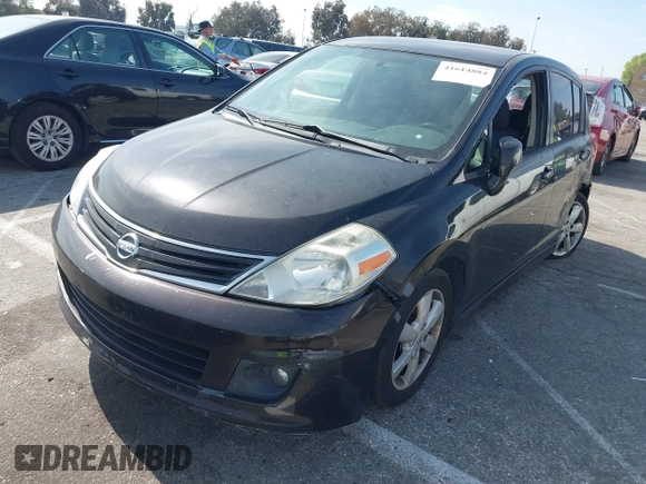 2012 Nissan Versa S with VIN 3N1BC1CP4CK203309, listed as a IAAI auction lot 41614884 with 141,770 mi miles. Bid and sale history available at carsss.com. Image 2.