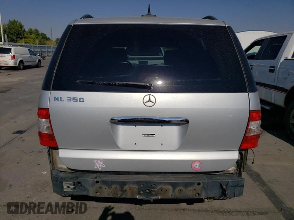 2005 Mercedes-Benz M-Class 3.7L with VIN 4JGAB57E35A544146, listed as a Copart auction lot 73055234 with 217,876 mi miles and Salvage Title. Bid and sale history available at carsss.com. Image 6.