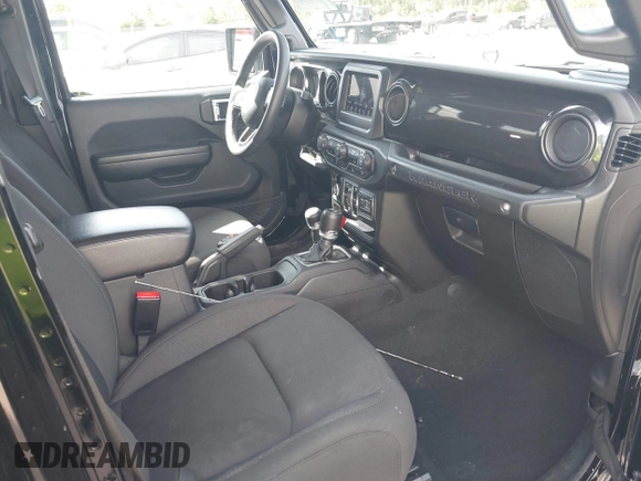 2023 Jeep Wrangler Willys with VIN 1C4HJXDN1PW634763, listed as a IAAI auction lot 41689202 with 23,369 mi miles and . Bid and sale history available at DreamBid. Image 5.
