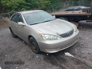 2005 Toyota Camry STD with VIN 4T1BE32K95U957071, listed as a IAAI auction lot 42207986 with 241,660 mi miles and . Bid and sale history available at DreamBid. Image 1.