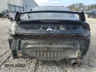 2007 Mitsubishi Eclipse GT with VIN 4A3AK34T47E013980, listed as a Copart auction lot 79622054 with 143,809 mi miles and Salvage Title. Bid and sale history available at carsss.com. Image 6.