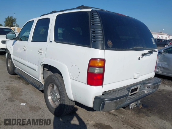 2002 Chevrolet Tahoe LS z VIN 1GNEC13TX2R240719, wystawiony jako IAAI lot #41616356 z przebiegiem 235 081 mil mil oraz . Historia ofert i sprzedaży dostępna na DreamBid. Obrazek 3.