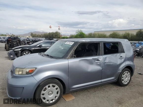 2010 Scion xB with VIN JTLZE4FE3A1100385, listed as a Copart auction lot 53754515 with 99,701 mi miles and Salvage Title. Bid and sale history available at DreamBid. Image 1.