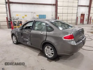 2009 Ford Focus SEL with VIN 1FAHP37N39W253086, listed as a IAAI auction lot 41825983 with 158,720 mi miles. Bid and sale history available at carsss.com. Image 3.