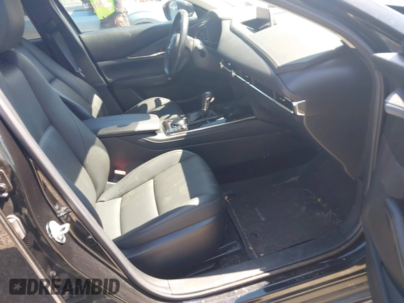 2023 Mazda CX-30 S Carbon Edition with VIN 3MVDMBCM1PM509987, listed as a IAAI auction lot 42060833 with 14,140 mi miles and . Bid and sale history available at DreamBid. Image 5.