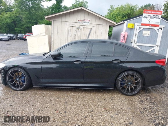 2018 BMW 5 Series M550i xDrive with VIN WBAJB9C5XJB286923, listed as a IAAI auction lot 42527301 with 76,923 mi miles and . Bid and sale history available at DreamBid. Image 14.