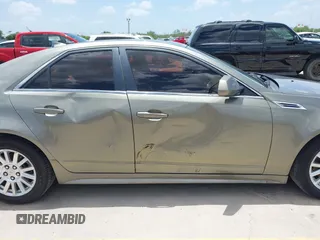 2010 Cadillac CTS Luxury with VIN 1G6DG5EG6A0148433, listed as a IAAI auction lot 42686517 with 106,701 mi miles and . Bid and sale history available at DreamBid. Image 14.