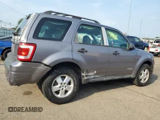 2008 Ford Escape XLS with VIN 1FMCU02Z38KA28478, listed as a Copart auction lot 62279955 with 166,124 mi miles and Salvage title. Bid and sale history available at DreamBid. Image 3.