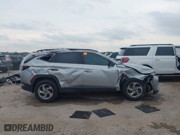2023 Hyundai Tucson SEL with VIN 5NMJBCAE9PH173732, listed as a IAAI auction lot 42408802 with 37,378 mi miles and . Bid and sale history available at DreamBid. Image 13.