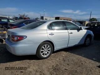 2003 Lexus ES 300 with VIN JTHBF30G530099830, listed as a Copart auction lot 52712945 with 142,874 mi miles and Salvage Title. Bid and sale history available at DreamBid. Image 3.