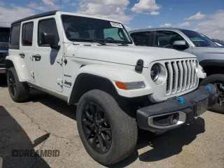 2023 Jeep Wrangler Sahara with VIN 1C4JJXP67PW630321, listed as a Copart auction lot 54579155 with 40,024 mi miles and Clean Title. Bid and sale history available at DreamBid. Image 4.