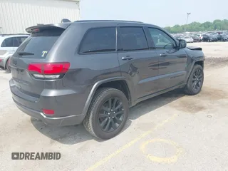 2018 Jeep Grand Cherokee Laredo E with VIN 1C4RJFAG7JC294905, listed as a IAAI auction lot 42452977 with 75,916 mi miles and . Bid and sale history available at DreamBid. Image 4.