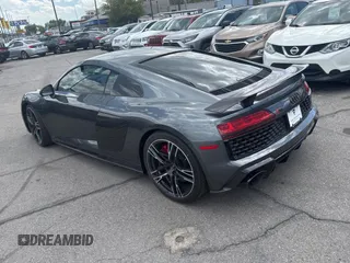 2021 Audi R8 z VIN WUAKBAFX7M7900472, wystawiony jako Copart lot #58422395 z przebiegiem 6493 mil mil oraz Szkody całkowita. Historia ofert i sprzedaży dostępna na DreamBid. Obrazek 3.
