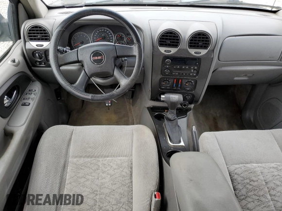 2006 GMC Envoy SLT with VIN 1GKDS13SX62354690, listed as a Copart auction lot 84138814 with 194,669 mi miles and Salvage Title. Bid and sale history available at carsss.com. Image 8.