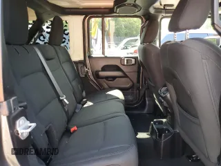 2018 Jeep Wrangler Unlimited Sahara with VIN 1C4HJXEGXJW229881, listed as a Copart auction lot 58762775 with 82,470 mi miles and Salvage title. Bid and sale history available at DreamBid. Image 11.