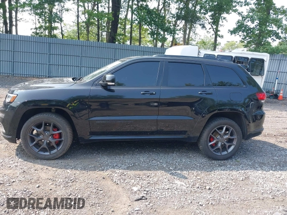 2019 Jeep Grand Cherokee Limited z VIN 1C4RJFBG6KC696561, wystawiony jako IAAI lot #42497444 z przebiegiem 50 769 mil mil oraz . Historia ofert i sprzedaży dostępna na DreamBid. Obrazek 14.