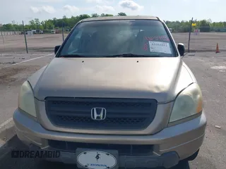 2005 Honda Pilot LX z VIN 2HKYF18125H532381, wystawiony jako IAAI lot #42054852 z przebiegiem 236 410 mil mil oraz . Historia ofert i sprzedaży dostępna na DreamBid. Obrazek 6.
