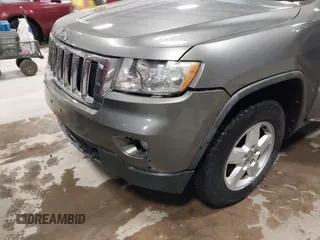 2011 Jeep Grand Cherokee Laredo with VIN 1J4RR4GG3BC623048, listed as a IAAI auction lot 42163452 with 192,241 mi miles and . Bid and sale history available at DreamBid. Image 12.