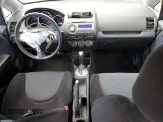 2007 Honda Fit Sport z VIN JHMGD38697S018037, wystawiony jako Copart lot #80060584 z przebiegiem 69 958 mil mil oraz Szkoda całkowita • Salvage title. Historia ofert i sprzedaży dostępna na DreamBid. Obrazek 8.