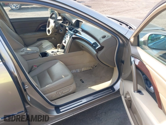 2006 Acura RL z VIN JH4KB16596C005876, wystawiony jako IAAI lot #42666228 z przebiegiem 146 897 mil mil oraz . Historia ofert i sprzedaży dostępna na DreamBid. Obrazek 5.