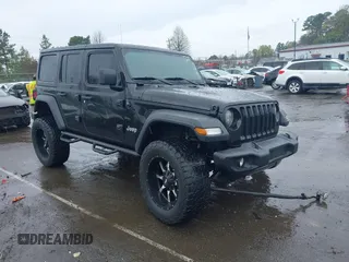 2018 Jeep Wrangler Unlimited Sport S z VIN 1C4HJXDG7JW227605, wystawiony jako IAAI lot #41864465 z przebiegiem 75 594 mil mil oraz . Historia ofert i sprzedaży dostępna na DreamBid. Obrazek 1.