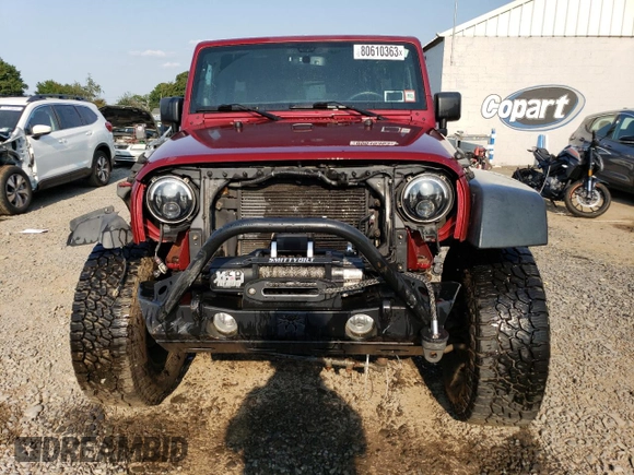 2013 Jeep Wrangler Unlimited Rubicon 10th Anniversary z VIN 1C4HJWFG2DL572943, wystawiony jako Copart lot #80610363 z przebiegiem 88 296 mil mil oraz Szkoda całkowita • Salvage title. Historia ofert i sprzedaży dostępna na DreamBid. Obrazek 5.