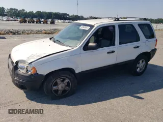 2004 Ford Escape XLS with VIN 1FMYU021X4DA07352, listed as a Copart auction lot 68909864 with 275,776 mi miles and Salvage Title. Bid and sale history available at carsss.com. Image 1.