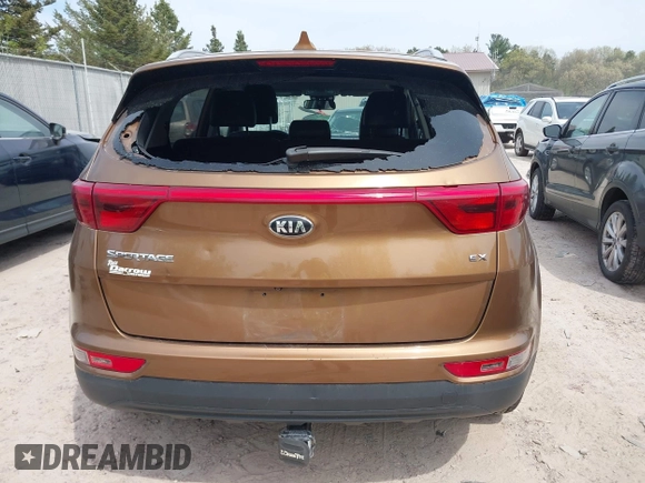 2017 Kia Sportage EX z VIN KNDPNCAC3H7113373, wystawiony jako IAAI lot #42221002 z przebiegiem 112 931 mil mil oraz . Historia ofert i sprzedaży dostępna na DreamBid. Obrazek 16.