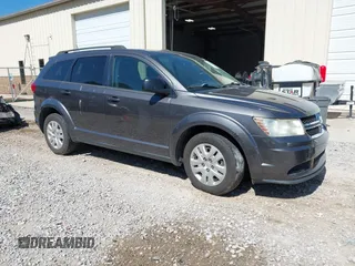 2015 Dodge Journey American Value z VIN 3C4PDCAB2FT565933, wystawiony jako IAAI lot #42327885 z przebiegiem 177 544 mil mil oraz . Historia ofert i sprzedaży dostępna na DreamBid. Obrazek 1.