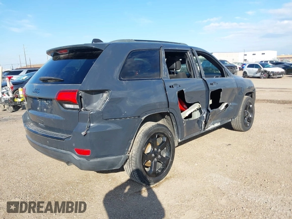 2018 Jeep Grand Cherokee Laredo E with VIN 1C4RJFAG4JC370502, listed as a IAAI auction lot 41342367 with 104,307 mi miles. Bid and sale history available at carsss.com. Image 4.