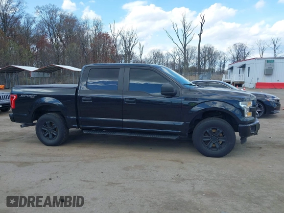 2015 Ford F-150 XLT with VIN 1FTEW1E8XFFB58716, listed as a IAAI auction lot 41854120 with 181,529 mi miles and . Bid and sale history available at DreamBid. Image 13.