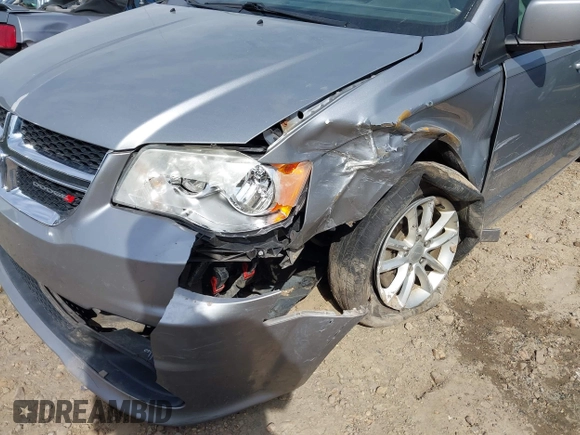 2014 Dodge Grand Caravan SXT with VIN 2C4RDGCG4ER106106, listed as a IAAI auction lot 41830512 with 135,044 mi miles and . Bid and sale history available at DreamBid. Image 6.