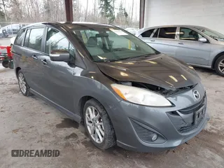 2014 Mazda 5 Touring with VIN JM1CW2CL7E0167945, listed as a IAAI auction lot 41624435 with 167,736 mi miles. Bid and sale history available at carsss.com. Image 1.