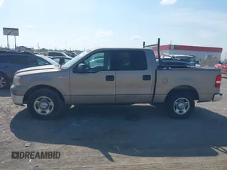 2004 Ford F-150 XLT with VIN 1FTRW12W74KD52290, listed as a IAAI auction lot 42066324 with 252,866 mi miles. Bid and sale history available at carsss.com. Image 14.