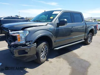 2019 Ford F-150 XL with VIN 1FTEW1C44KKE81550, listed as a IAAI auction lot 42012568 with 53,978 mi miles and . Bid and sale history available at carsss.com. Image 2.