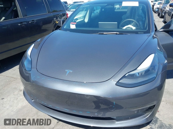 2022 Tesla Model 3 with VIN 5YJ3E1EA0NF344782, listed as a IAAI auction lot 41803469 with 16,973 mi miles and . Bid and sale history available at DreamBid. Image 10.